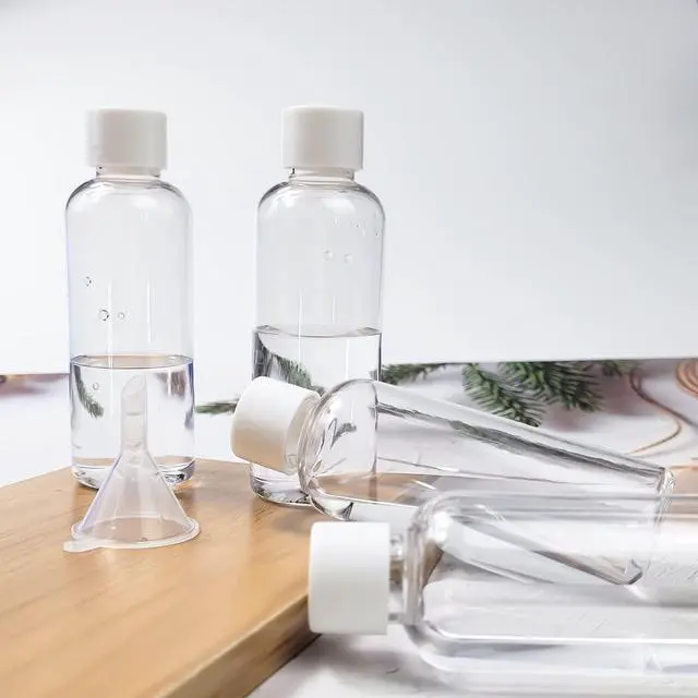 Alt view image 5 of 7 - 4pcs Travel Bottles,80ml Refillable Clear Empty Plastic Travel Size Containers Bottles with Screw Lids for Toiletries,Soap,Shampoo and Conditioner