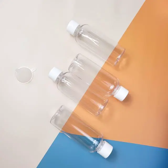 Alt view image 6 of 7 - 4pcs Travel Bottles,80ml Refillable Clear Empty Plastic Travel Size Containers Bottles with Screw Lids for Toiletries,Soap,Shampoo and Conditioner