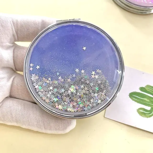 Alt view image 3 of 7 - HSYHERE Super Beautiful Dreamy Star Sky Quicksand Moving Sand Small Mini Mirror Double-Sided Portable Compact Round Glitter Foldable Fashion Hand Makeup Portable Travel Pocket Mirror -Yellow