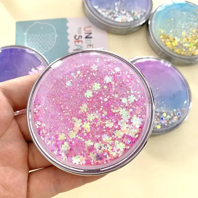 Alt view image 4 of 7 - HSYHERE Super Beautiful Dreamy Star Sky Quicksand Moving Sand Small Mini Mirror Double-Sided Portable Compact Round Glitter Foldable Fashion Hand Makeup Portable Travel Pocket Mirror -Yellow