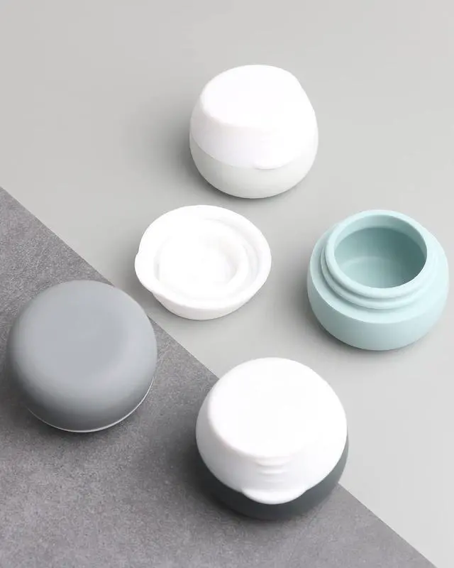 Alt view image 6 of 7 - Gemice Travel Size Containers for Toiletries,1oz,4 Pack,Grey | TSA Approved Silicone Cream JarsLeak-proof Travel Accessories with Lid,For Cosmetic Makeup Face Body Hand Cream
