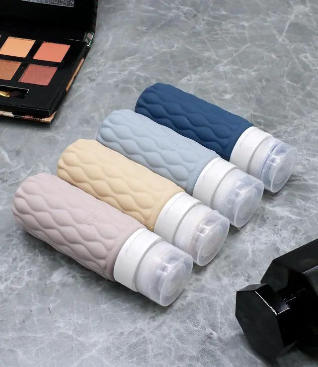 Alt view image 6 of 7 - 3.4oz Silicone Travel Bottles for Toiletries Refillable Liquid Accessories | for Shampoo and Conditioner, TSA Approved Leakproof Squeeze Bottles Travel-friendly with Labels/Clear Bag