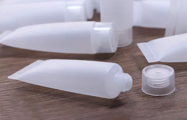 Alt view image 2 of 6 - Shapenty 10ml Clear Plastic Empty Tubes Refillable Facial Cleanser Hand Cream Cosmetic Lotion Containers Soft Makeup Sample Holder Bottle Vial Jar Pot Case with Flip Lid for Travel DIY Project, 30PCS