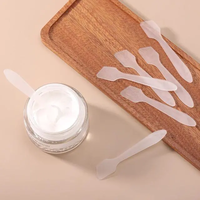 Alt view image 4 of 7 - Tbestmax 300 PCS Mini Cosmetic Spatulas 3.2" x 0.6" Disposable Makeup Plastic Spatulas Clear for Facial Creams and Skin Care