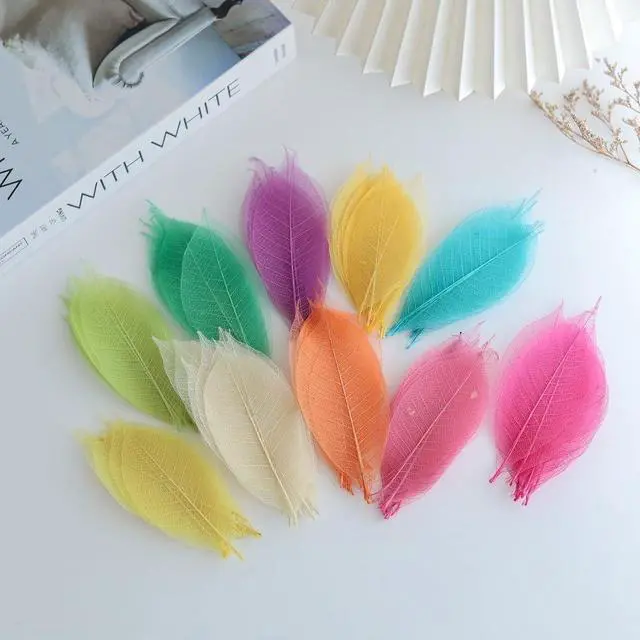 Alt view image 2 of 5 - Mixed Colors 4-5 Inches 100 PCS Natural Skeleton Leaves, Real Rubber Tree Leaf Veins for Resin Art, Scrapbooking, Card Making, Wedding Decorations and DIY Crafts(Mixed Colors)