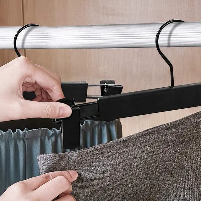 Alt view image 4 of 7 - Pants Hangers with Clips, Skirt Hangers, 10 Pack, Black | Plastic clip hangers for pants, skirts, jeans and shorts; 360° swivel hooks help save closet space.