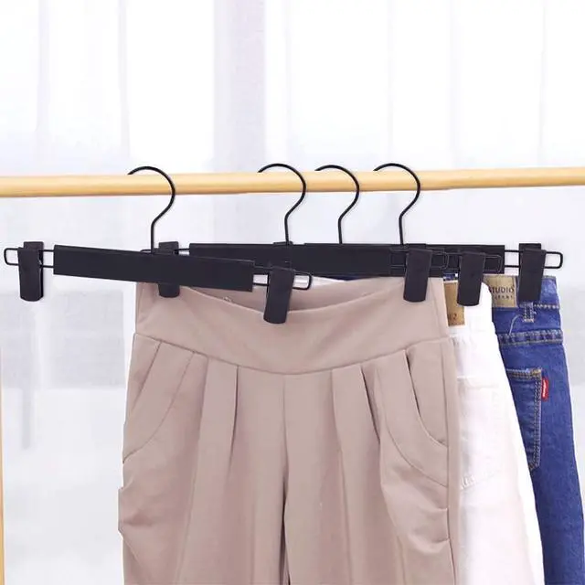 Alt view image 5 of 7 - Pants Hangers with Clips, Skirt Hangers, 10 Pack, Black | Plastic clip hangers for pants, skirts, jeans and shorts; 360° swivel hooks help save closet space.