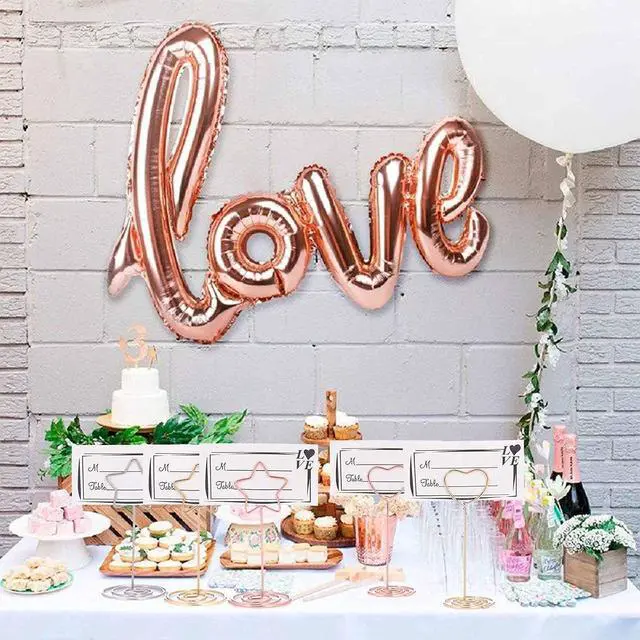 Alt view image 6 of 7 - 12pcs Table Number Holders Metal, 3.35 inch Place Card Stands for Wedding Centerpieces, Birthday Party - Table Card & Photo Picture Holders (Rose Gold-Heart Shaped)