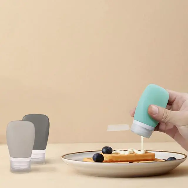 Alt view image 4 of 7 - 4Pcs Squeeze Salad Dressing Bottles, Leakproof Mini Sauce Condiment Bottles and Dressing to Go for Lunch, Portable Salad Dressing Container with 2Pcs Cleaning Brush (2OZ, 60ML)