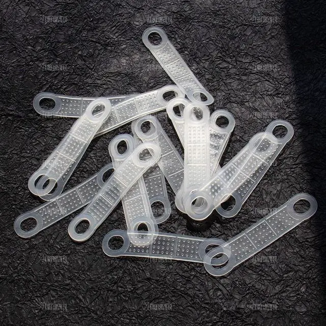 Alt view image 3 of 7 - AUEAR, 100 Pack Clear Non-Slip Rubber Clothes Grips Clothing Strips for Wood Plastic Hangers Home Stores Use