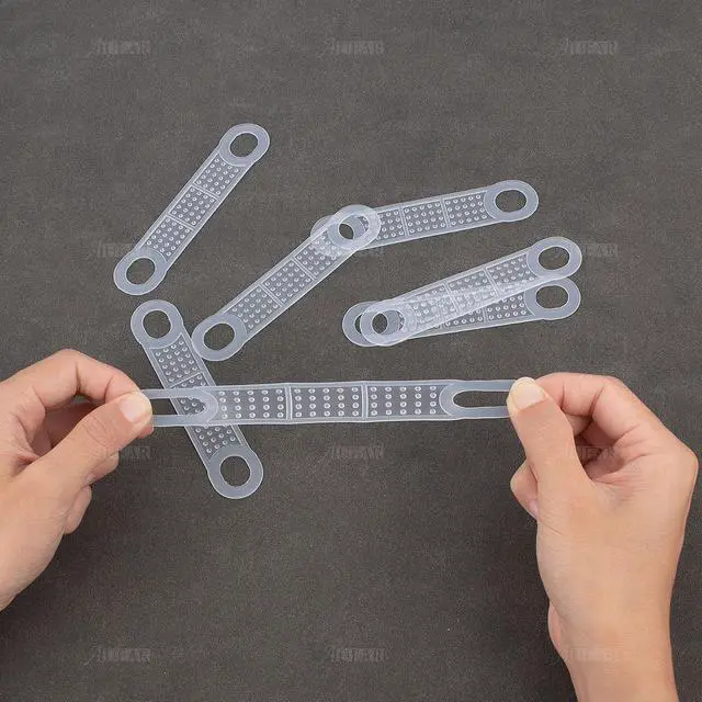 Alt view image 4 of 7 - AUEAR, 100 Pack Clear Non-Slip Rubber Clothes Grips Clothing Strips for Wood Plastic Hangers Home Stores Use
