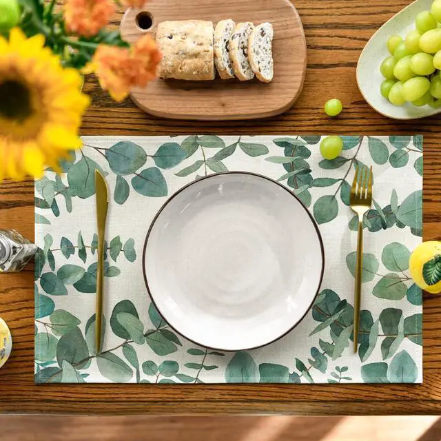 Alt view image 2 of 7 - Artoid Mode Eucalyptus Leaves Summer Placemats for Dining Table, 12 x 18 Inch Spring Seasonal Holiday Rustic Vintage Washable Table Mats Set of 4 Green