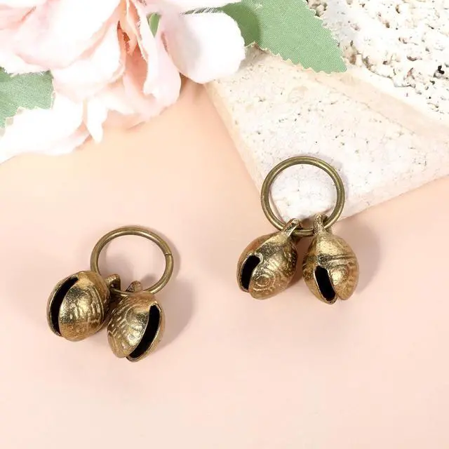 Alt view image 5 of 7 - Styquenzer Copper Bell for Dog Collar, 4 PCS Brass Dog Bells Extra Loud Collar Bell for Pet Tracking Anti Lost Training Pets Pendant Accessories Anti Theft Bells for Little Dogs & Cats