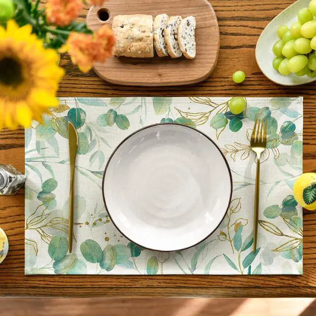 Alt view image 2 of 7 - Artoid Mode Eucalyptus Summer Placemats for Dining Table, 12 x 18 Inch Spring Seasonal Holiday Decoration Rustic Vintage Washable Table Mats Set of 4 Beige