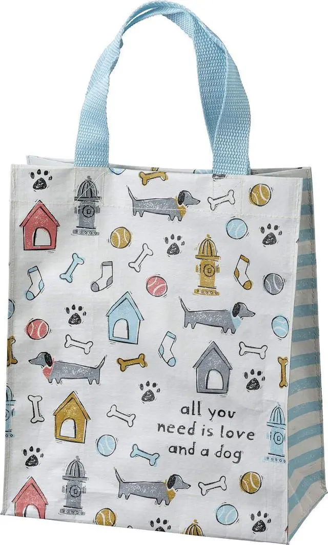 Main image of Primitives by Kathy All You Need Is Love And A Dog Daily Tote Bag, double-sided,All You Need Is Love And A Dog sentiment with all-over dog themed block print design/complementing blue straps