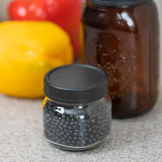 Alt view image 5 of 5 - Bedgeta 9 Black Plastic Regular Mouth Mason Jar Lids with Silicone Ring,Thickened Leak-proof Lids Fit Ball,Kerr and More, 70mm(Black)