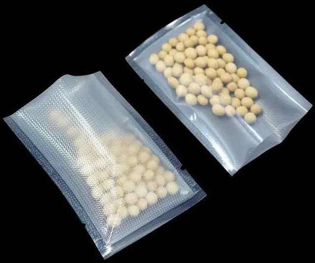 Main image of FERENLI 100 Pieces 2.7x3.9 inch (Usable Size 2.4x3.3 inch) Small Vacuum Sealer Bags for Food Storage Open Top Clear Plastic Flat Pouches Bulk Food Packaging Bags with Tear Notch