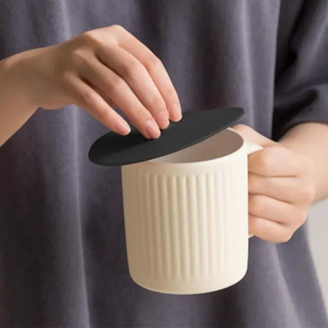 Alt view image 3 of 7 - Carrotez Silicone Cup Cover Lids, 4.3 Inch, 2 Pack - Black | Mug Covers, Reusable Silicone Coffee and Tea Cup Lids