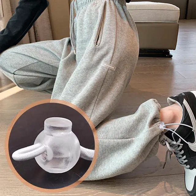 Alt view image 3 of 5 - CooBigo 12PCS Plastic Clear Cord Locks for Drawstring, Paracord Spring Toggle Stopper Clasp Sweatpants Hats String Clips Elastic Shoeslace Lock Bungee Swim Goggles Replacement (Transparent), Small