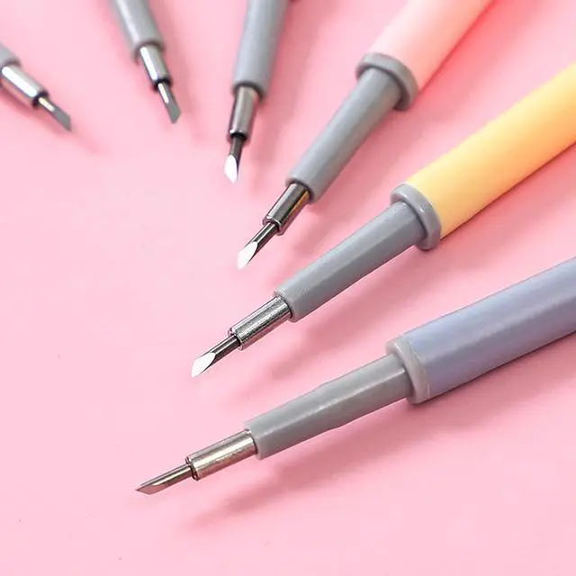 Alt view image 3 of 7 - Retractable Carving Pen Knife Set, 6 Replacement Blades, for DIY Crafts | easy to control, retractable design, non-slip coating, petite and portable, soft silicone material, press out the core