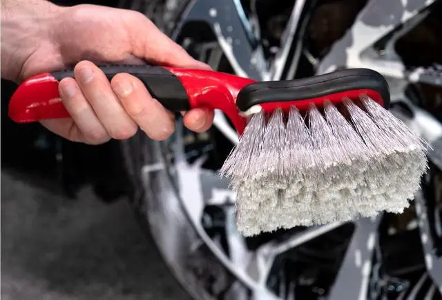 Alt view image 3 of 7 - Mothers Car Wash Brush, Wheel and Fender Brush, Short Handle Tire Cleaner for Car Detailing, 10 Inch, Red/Black