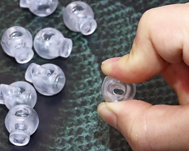 Alt view image 3 of 5 - Tupalizy Clear Plastic Cord Locks Single Hole Spring Toggle Stoppers Fastener Slider for Drawstring Pant Hat Bag Shoelace