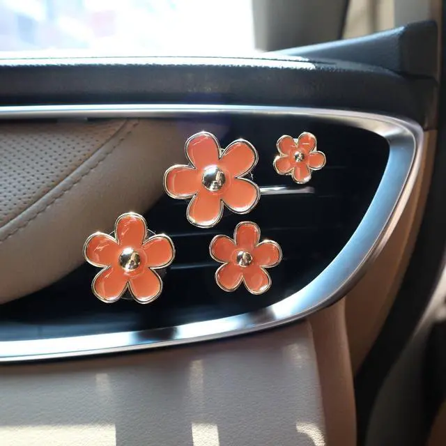 Alt view image 4 of 7 - ORIESSE Orange Car Accessories,4pcs Coral Flowers Air Vent Clips | Refillable Car Air freshener,Girly 4 Size Sparkle Daisy Vent Clips,Cute Car Decor for Women