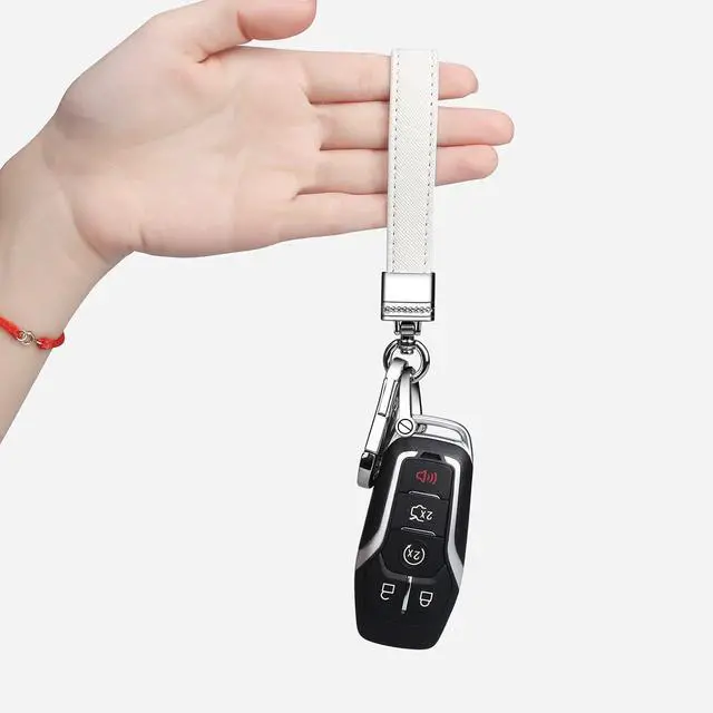 Alt view image 6 of 6 - QBUC Genuine Leather Car Keychain,Universal Heavy Duty Metal Key Chain Accessories,Car Fob Key Keychain Holder with 360 Degree Rotatable Snap Swivel and Anti-Lost D-Ring for Men Women(White)