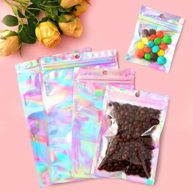 Alt view image 3 of 5 - Funfery 100 Pack Mylar Holographic Bags Party Favor Zipper Clear Bags | Foil Pouch Bag,Zip Iridescent Party Favor Bag for Goodie,Candy,Treat,Food,Card,Jewelry,Packaging for Small Business,3x4.7in