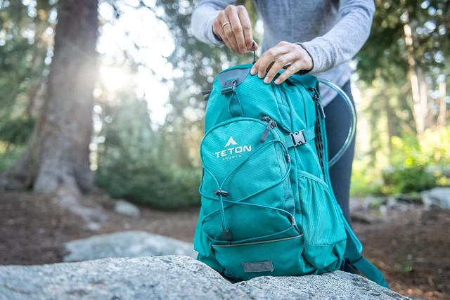 Alt view image 7 of 7 - Teton Oasis Hydration Backpack Lightweight Water Pack with Bladder & Sewn-in Rain Cover for Hiking, Running, Cycling & Biking, 18L/22L Sizes, Fits Men & Women