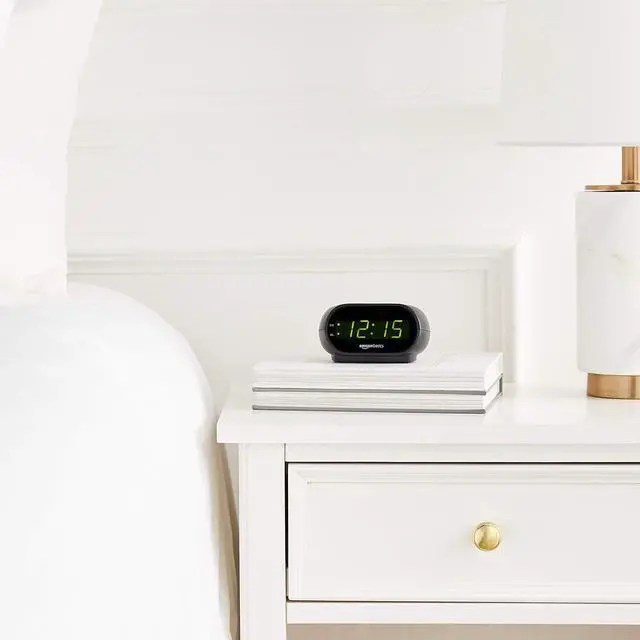 Alt view image 2 of 6 - Amazon Basics Small Digital Oval Alarm Clock with LED Display, Nightlight, Snooze Function & Battery Backup, Black, 4.5 x 3.5 x 2.4 Inches