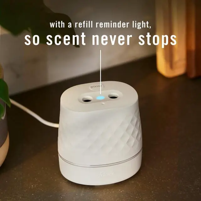 Alt view image 3 of 6 - Febreze PLUG Scent Booster Starter Kit, Continuous Scent Device, Oil Diffuser, Air Freshener Plug In + 1 Baked Cinnamon Apple Refill