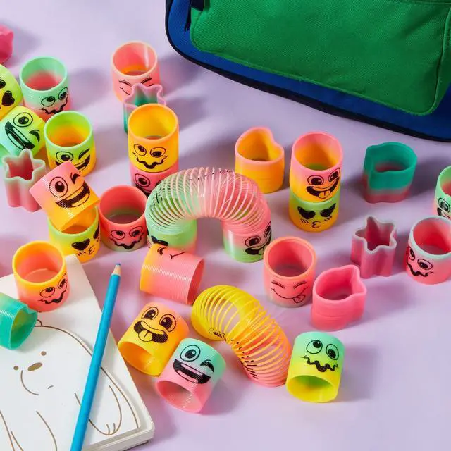 Alt view image 7 of 7 - 30 Pcs Spring Rainbow Party Favor, Mini Plastic Coil Spring Toy, Fidget Stress Coil Mini Springs Bulk Toys for Carnival Prize Birthday, Classroom Goodie Bag Stuffers