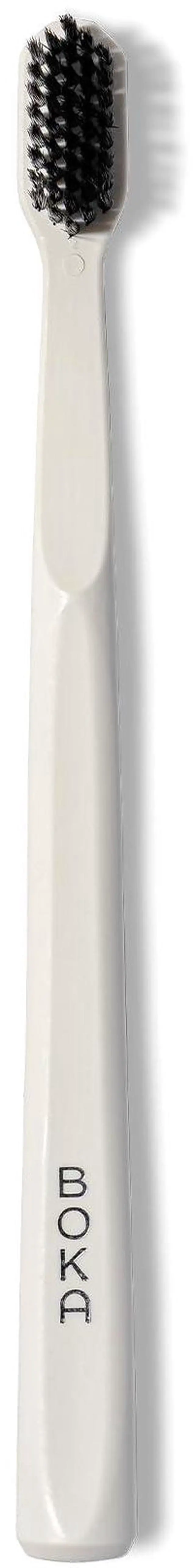 Main image of Classic Soft Bristle Manual Toothbrush - Activated Charcoal | Tapered Bristles for Sensitive Gums - BPA-Free Adult and Kids Care - Travel Cap Included - Bioplastic Handle - White, 1Pk