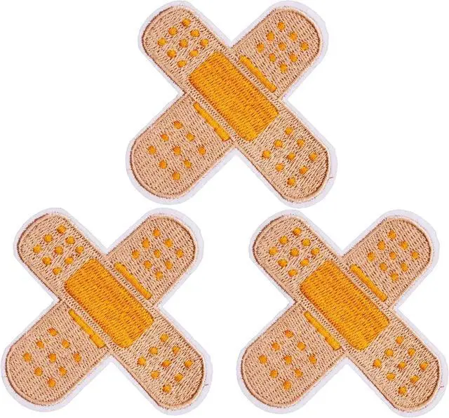Main image of U-Sky Sew or Iron on Embroidered Patches | Creative Cross-Shaped Band-Aid Design with Orange Center | Whimsical First Aid Theme | DIY Enthusiasts | Clothing Bags Accessories | 2.6"x2.6" 3PCs Pack
