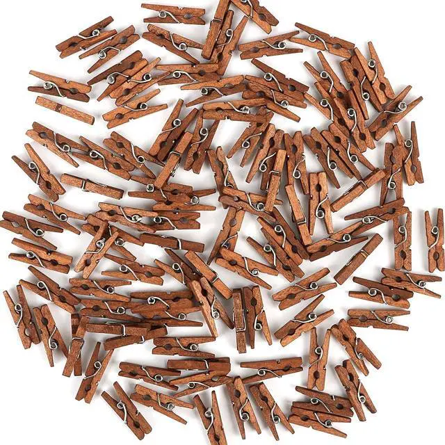Main image of CCINEE Mini Wooden Clothespins, 100 Pcs 1 Inch Vintage Brown Small Craft Clothes Pins for Photo Clips Scrap Booking Crafts Hanging Pictures Gift Wrapping