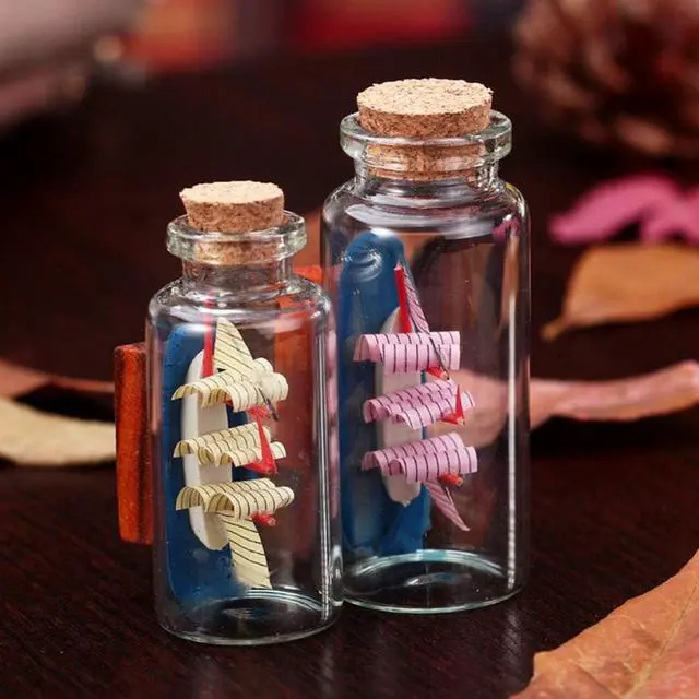 Alt view image 6 of 7 - Danmu 30ml 1.18" x 2.75" Potion Bottles,Mini Glass Bottles,Small Glass Jars for Wedding Favors,Halloween Decorations,Baby Shower,Party Favors(12Pcs)