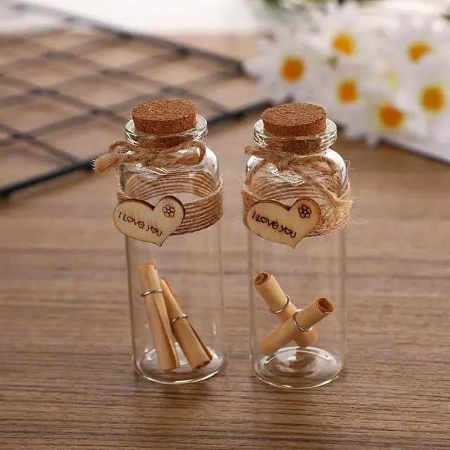 Alt view image 4 of 7 - Danmu 30ml 1.18" x 2.75" Potion Bottles,Mini Glass Bottles,Small Glass Jars for Wedding Favors,Halloween Decorations,Baby Shower,Party Favors(12Pcs)