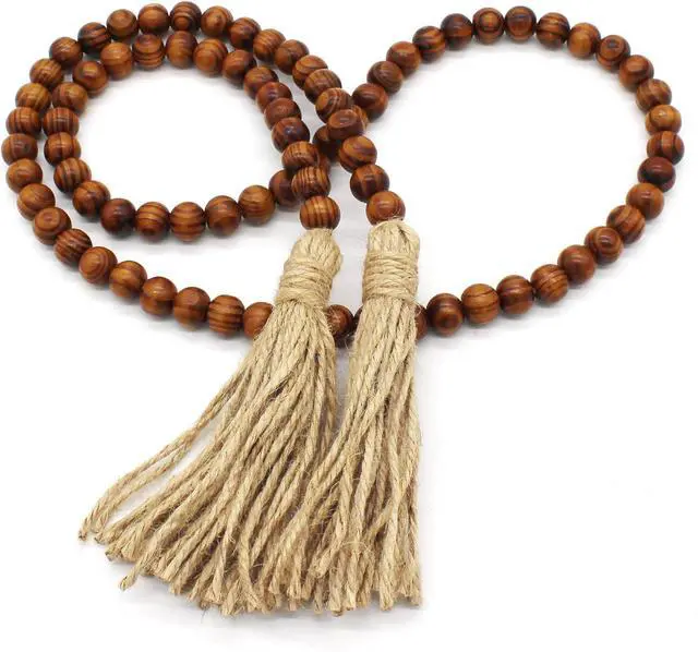 Main image of CVHOMEDECO. Wood Grain Beads Garland with Tassels Farmhouse Rustic Wooden Prayer Bead String Wall Hanging Accent for Home Festival Decor. Dark Tan