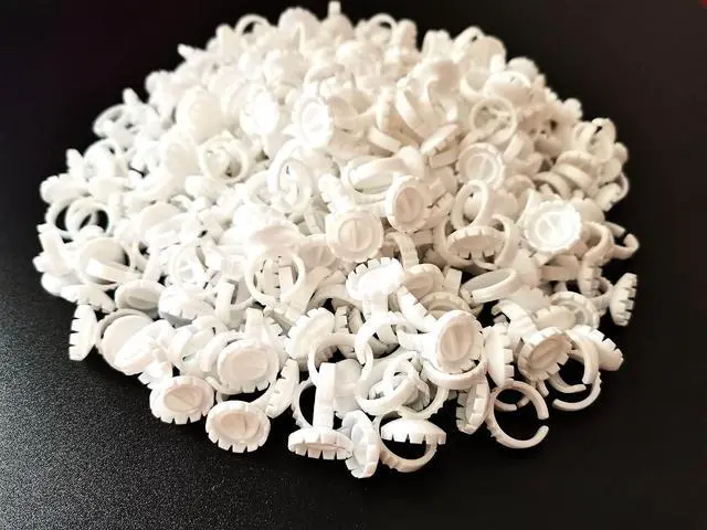 Alt view image 4 of 7 - Glue Rings for Eyelash Extension, 300 PCS Glue Rings Lash Extension Supplies Lash Rings for Glue, Disposable Glue Cups Eyelash Glue Holder Lash Extension Glue Rings, Lash Fan Blossom Glue Cups, White