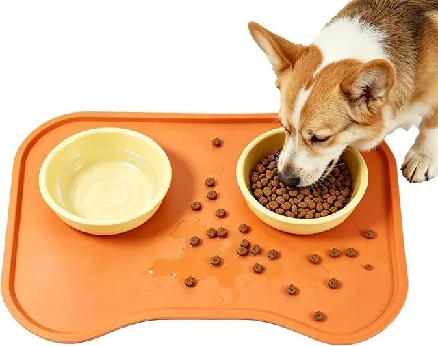 Main image of Silicone Pet Feeding Mat with Raised Edge, Washable Dog Cat Food and Water Mat for Floors Waterproof, Anti-Slip Placement Mat for Cat and Dog Bowl to Prevent Spills (Orange)