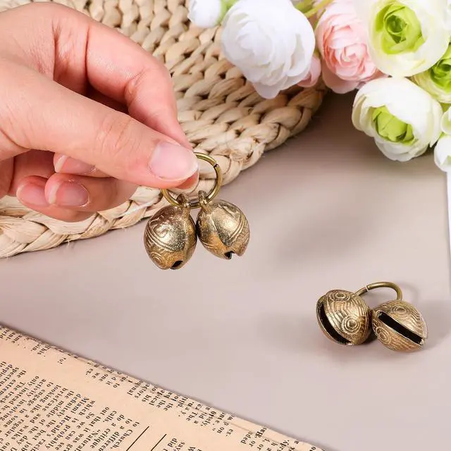 Alt view image 4 of 7 - Copper Bell for Dog Collar, 4 PCS Brass Dog Bells Extra Loud Collar Bell for Pet Tracking Anti Lost Training Pets Pendant Accessories Anti Theft Bells for Little Dogs & Cats