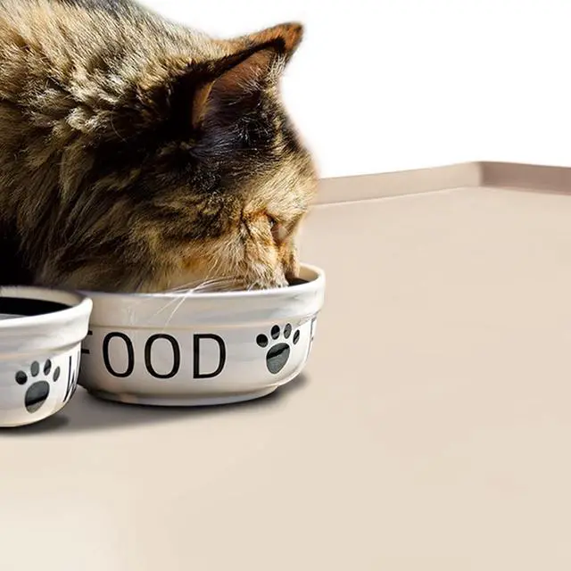 Alt view image 6 of 7 - Silicone Dog Food Mat Waterproof Pet Feeding Tray for Small Medium Dogs | Non slip pet bowl placemat with 0.6 inch raised edges and flexible roll up design.Fits most spaces.Size 18.5" x 11.5"