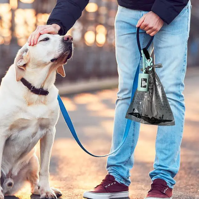 Alt view image 7 of 7 - Retractable Dog Poop Bag Dispenser and Waste Bag Holder Kit - Pink | Lightweight, Stretchy Strap Fits Any Dog Leash, Leak-Proof Bag Starter Roll Included, Dog Essentials for Walking and Travel