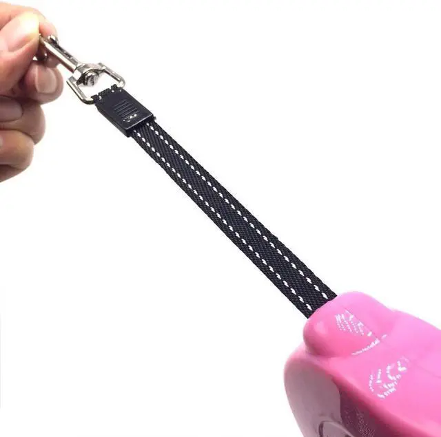 Alt view image 2 of 3 - Retractable Dog Leash (Small, Pink) | 10-Feet Cord for Small & Medium Breeds, Supports up to 25-pound, Strong Nylon Ribbon Lead, Durable, No Tangle