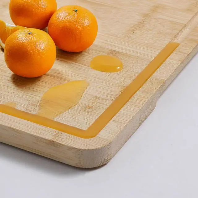 Alt view image 3 of 13 - Mainstays Bamboo Cutting Board, 8.5 x 11, with Juice Groove and Non-Slip Feet