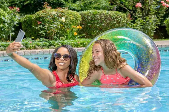Alt view image 4 of 7 - Poolmaster Rainbow Glitter Tube - Inflatable Swimming Pool Float