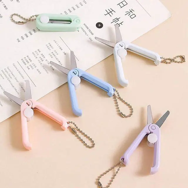Alt view image 7 of 7 - White Folding Scissors Safe Portable Travel Scissors Foldable Telescopic Cutter Pocket Mini Scissor