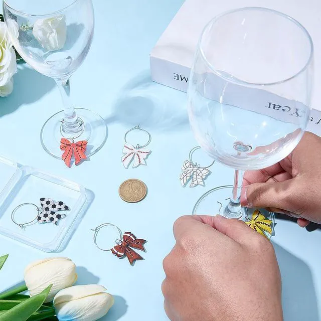 Alt view image 4 of 7 - 1 Box 6 Styles Bow Drink Charm Sports Wine Glass Charms Acrylic Soccer Tennis Softball Rugby Basketball Baseball Pattern Bowknot Cocktail Marker Identifier Tag for Stem Glasses Party Favors