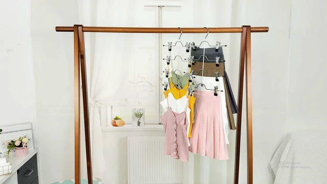 Alt view image 3 of 3 - 4 Tier Metal Skirt Hangers with Clips 80% Space Saving 2 Pack